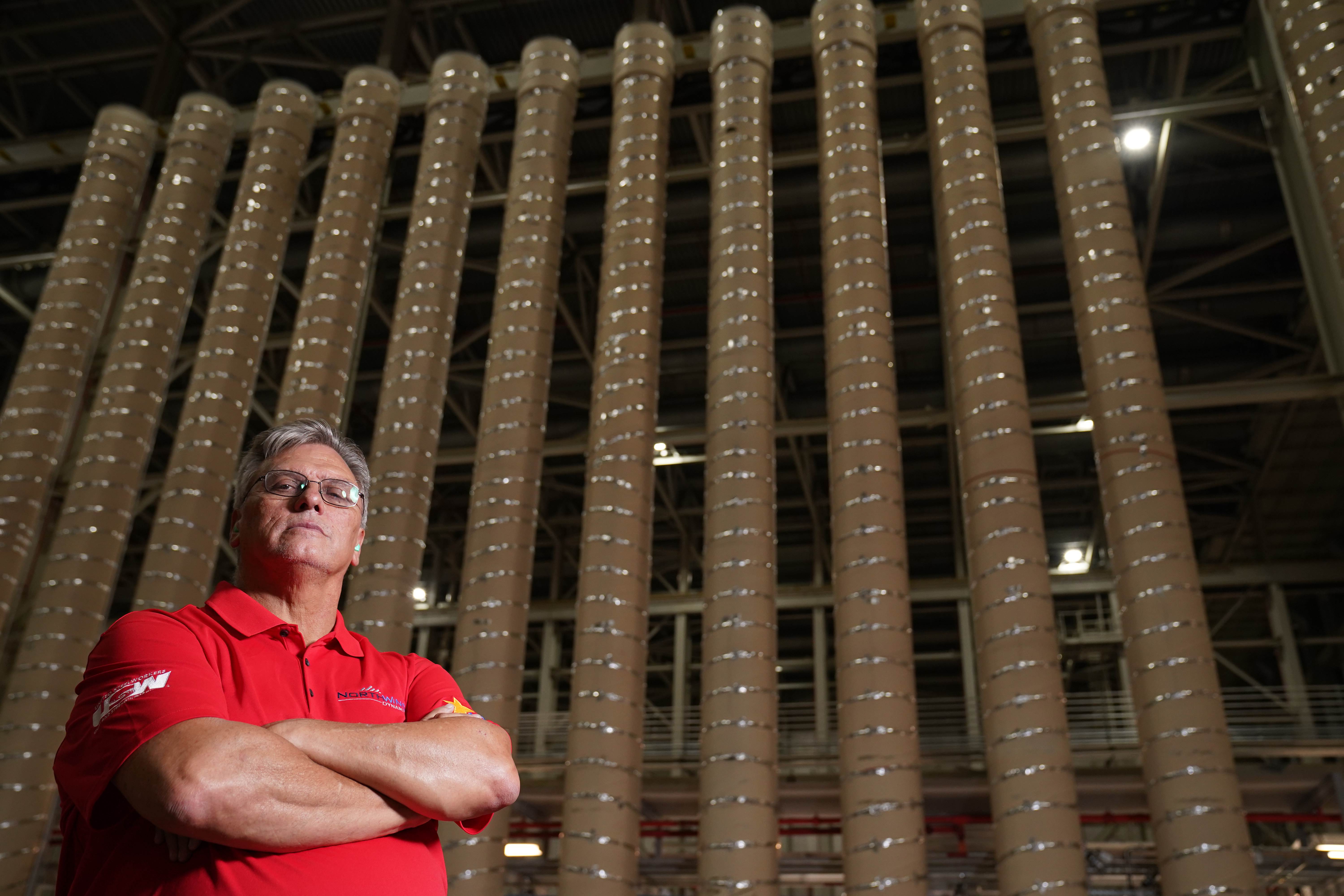 Man in front of centrifuges